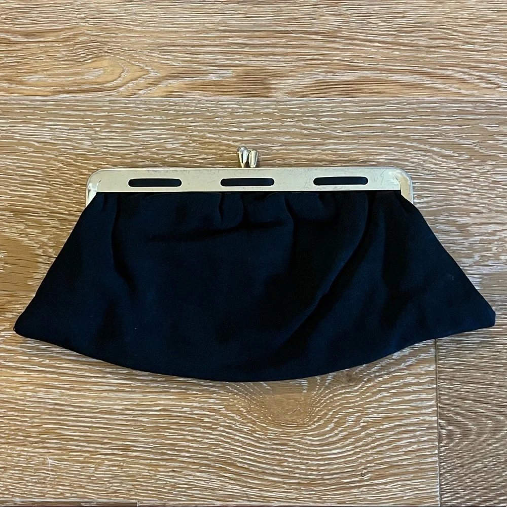 Fabric vintage clutch with a metal closure